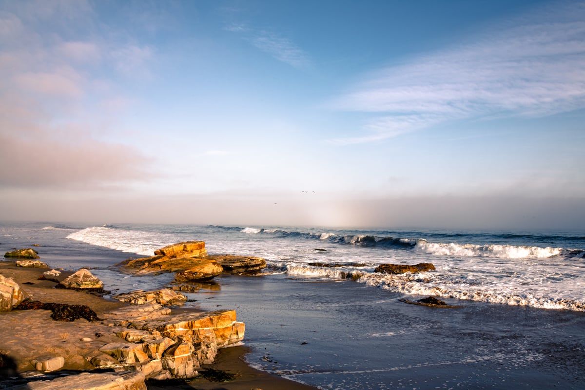 Foggy Beach by Khalogram Creative