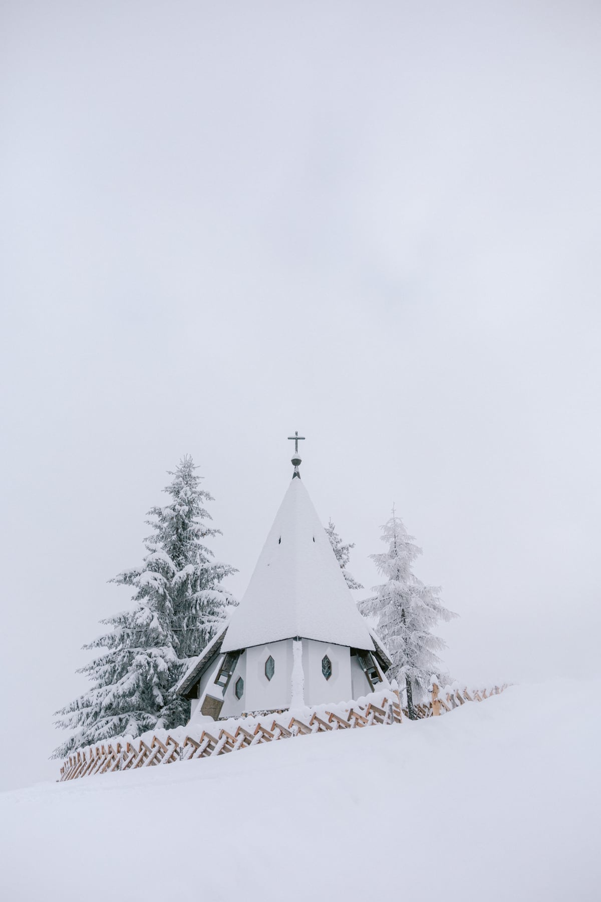 The white church on the snowy mountain by Marika Huisman