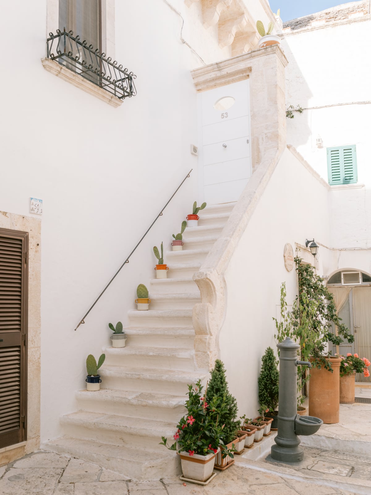 Stairs with cacti by Marika Huisman