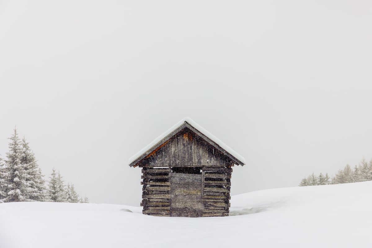 Wooden shed with snow by Marika Huisman