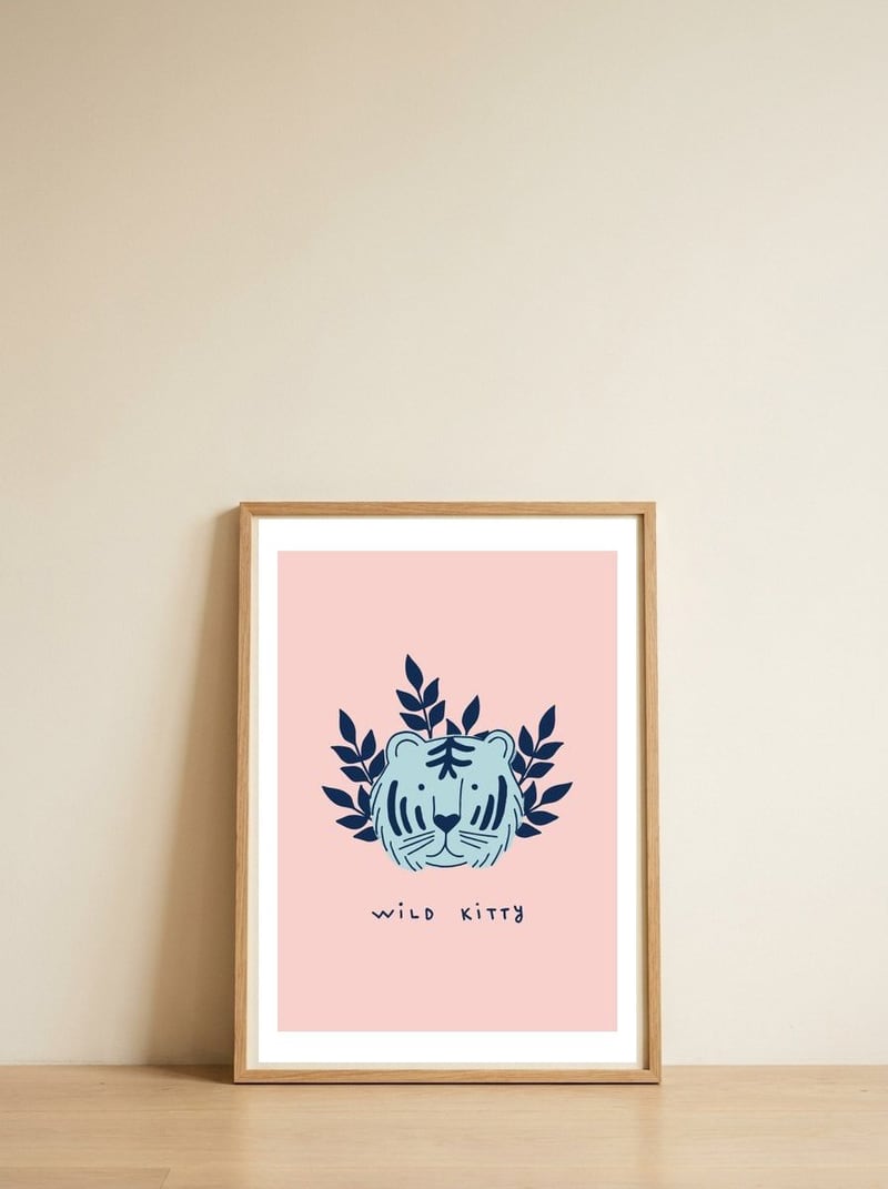 Wild Kitty — framed, leaning against the wall