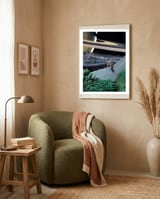 Titan framed in a tender room thumbnail
