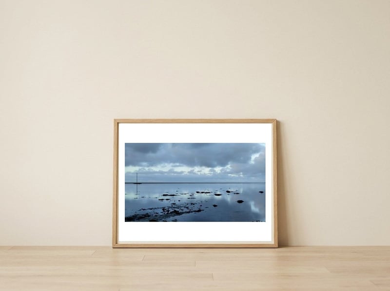 Estuary Reflection — framed, leaning against the wall