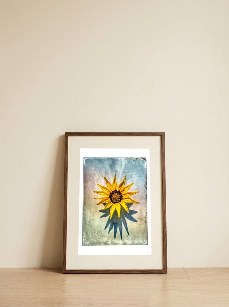 I like flowers — framed, leaning against the wall
