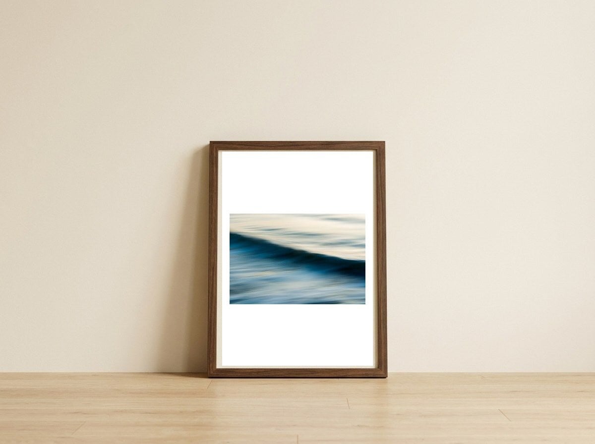 The Uniqueness of Waves X — framed, leaning against the wall
