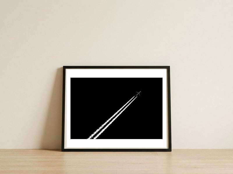 Black and White — framed, leaning against the wall