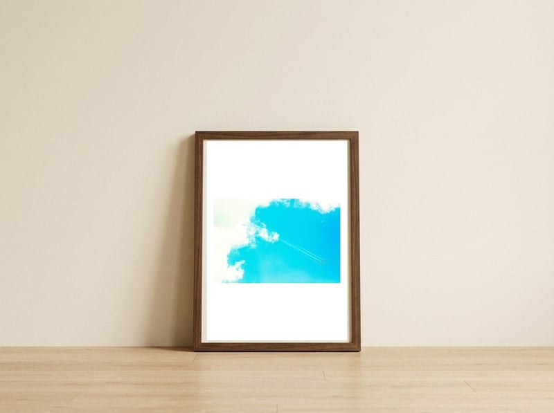 Aerial Show II — framed, leaning against the wall
