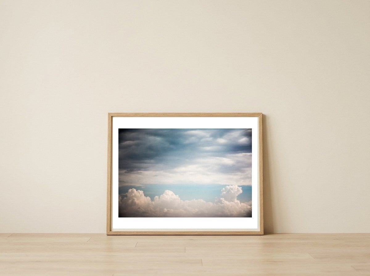 Autumn Clouds — framed, leaning against the wall