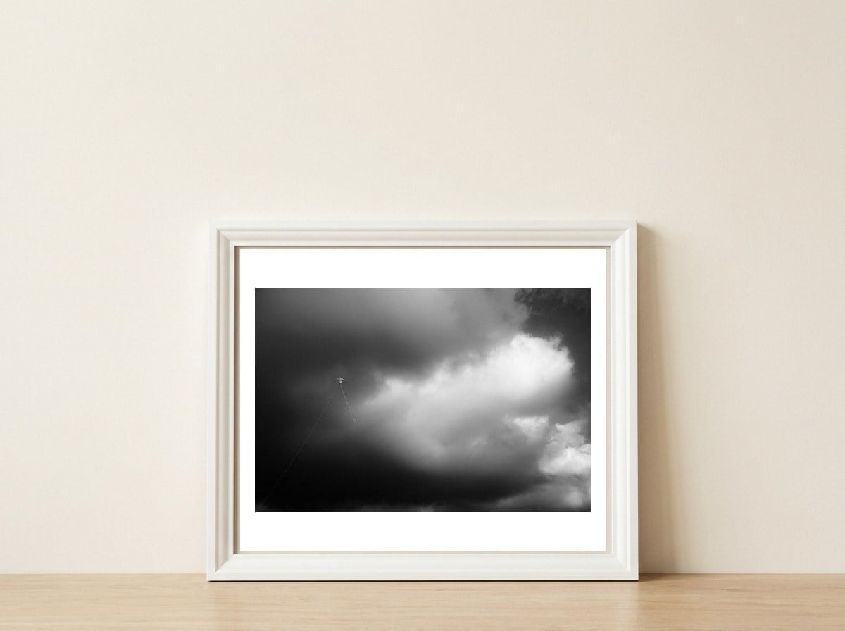The Kite — framed, leaning against the wall
