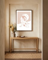 "For Love Not Money" in Orange framed in a welcoming room thumbnail