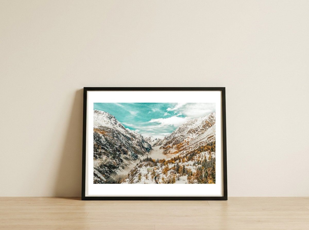 Snow & Sunny — framed, leaning against the wall