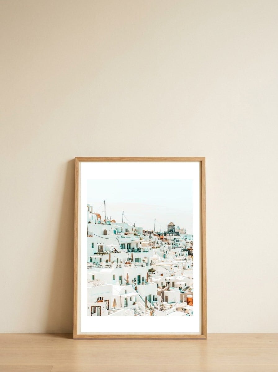 Travelers — framed, leaning against the wall