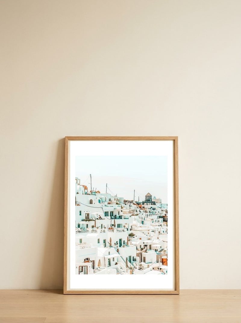 Travelers — framed, leaning against the wall