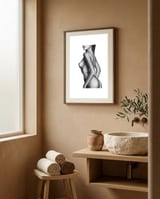 Nude framed in a serene room thumbnail
