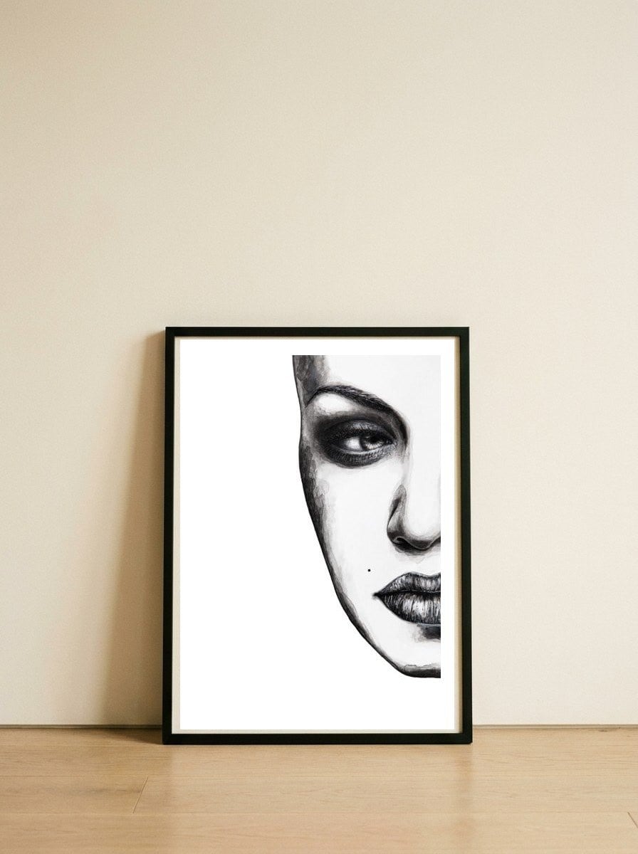 Face — framed, leaning against the wall