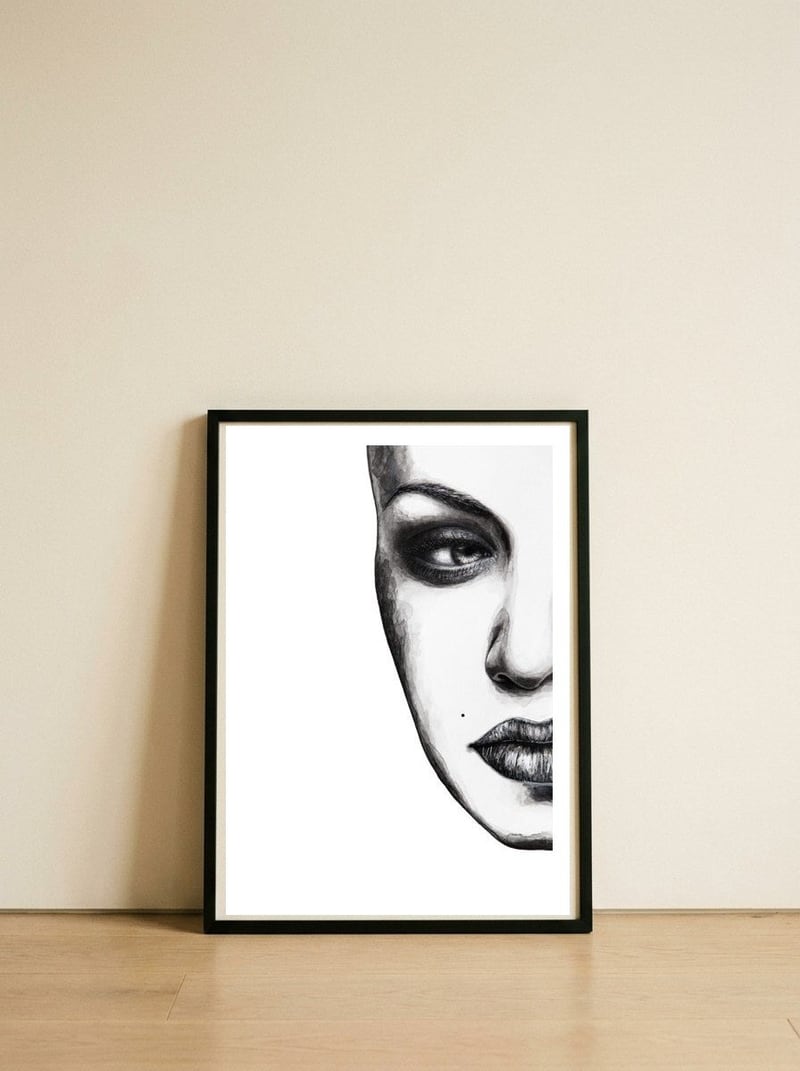 Face — framed, leaning against the wall