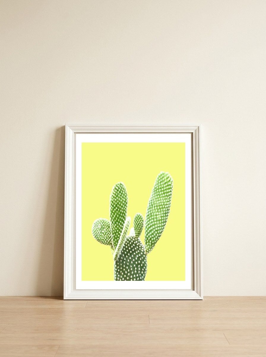 Cactus Yellow Background — framed, leaning against the wall