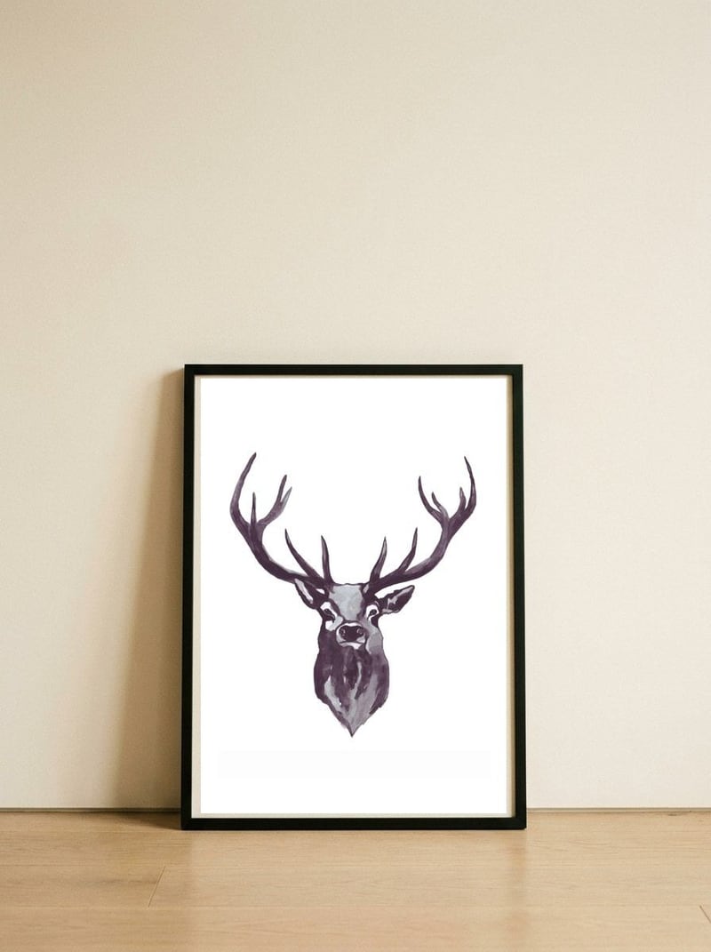 Mountain Love Stag — framed, leaning against the wall