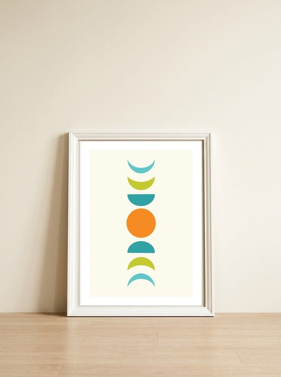 Abstract Moons Teal and Orange  — framed, leaning against the wall