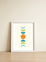 Abstract Moons Teal and Orange  — framed, leaning against the wall thumbnail