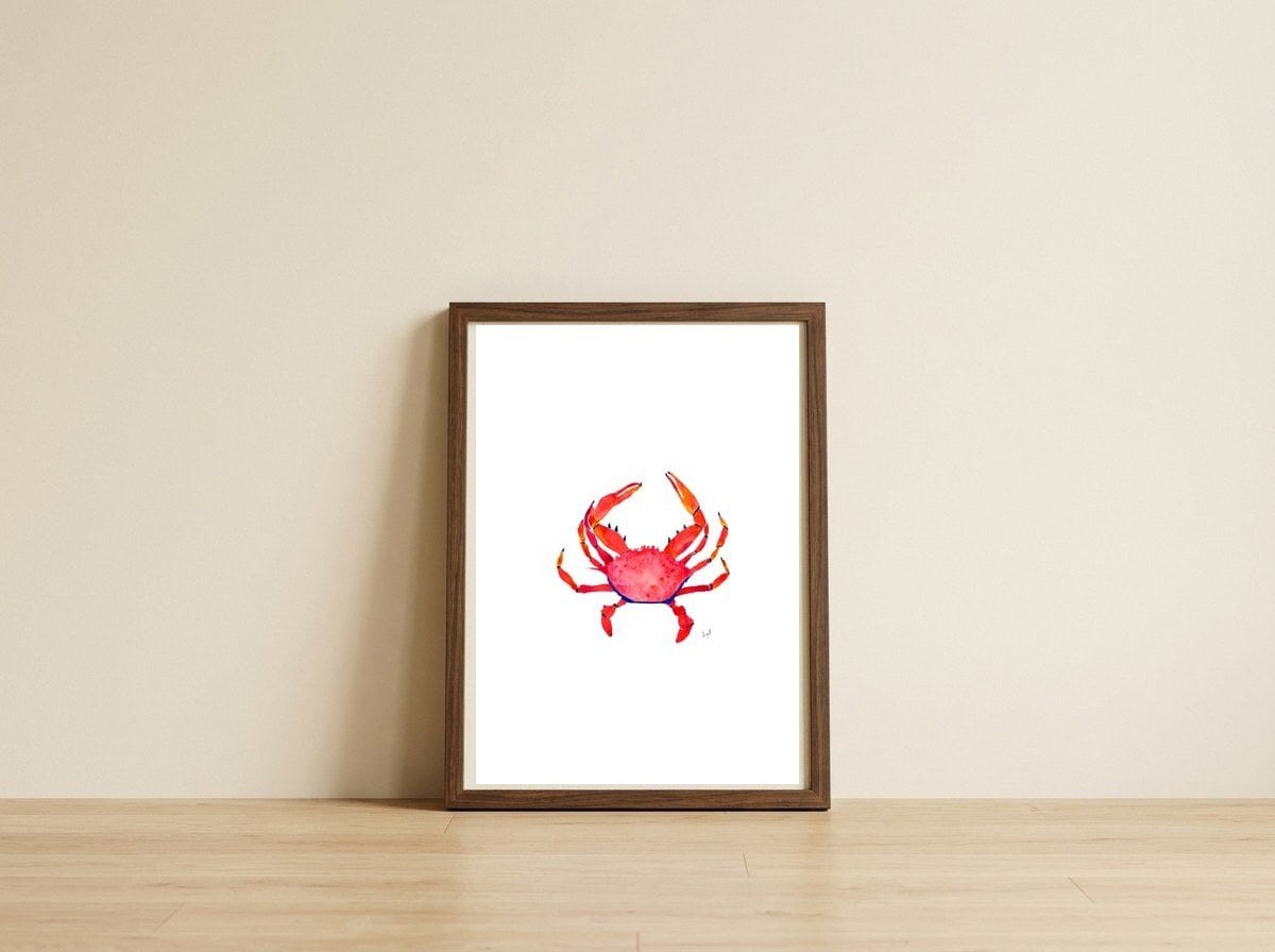 Red Crab — framed, leaning against the wall