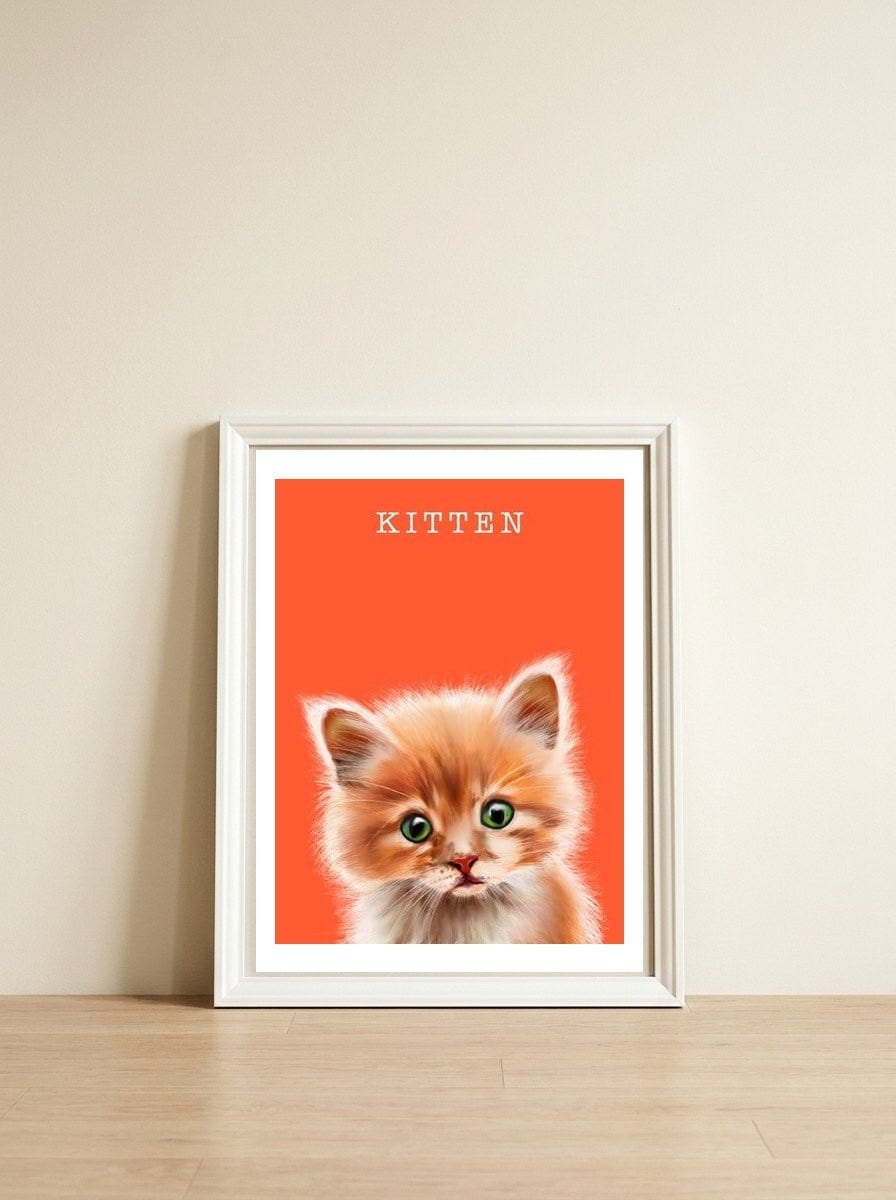 Kitten — framed, leaning against the wall
