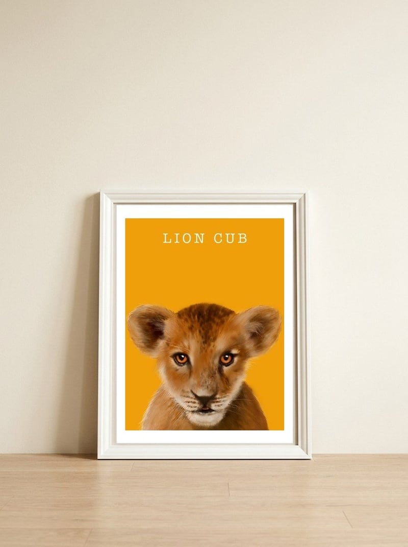 Lion Cub — framed, leaning against the wall