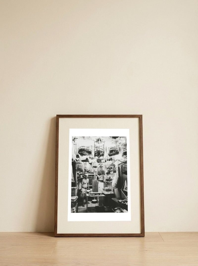 Yuen Po — framed, leaning against the wall