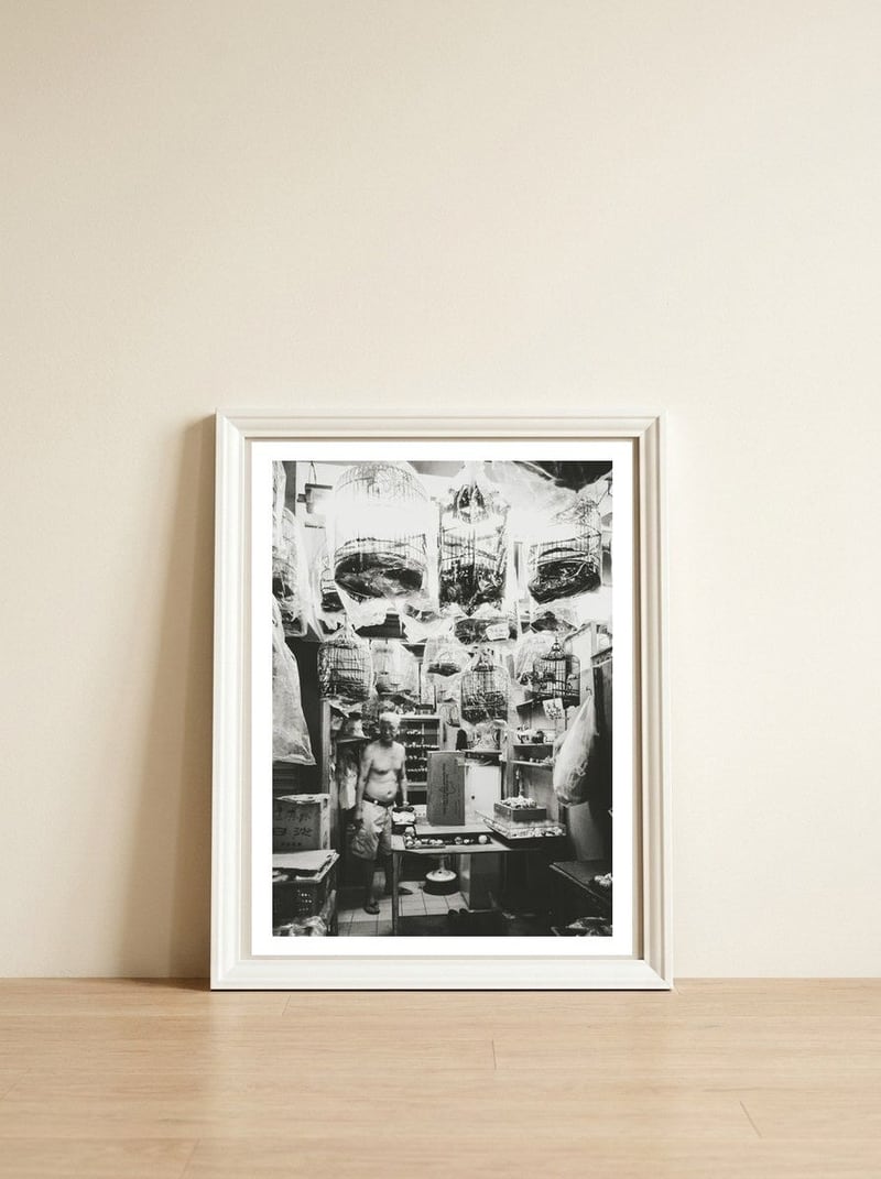 Yuen Po — framed, leaning against the wall