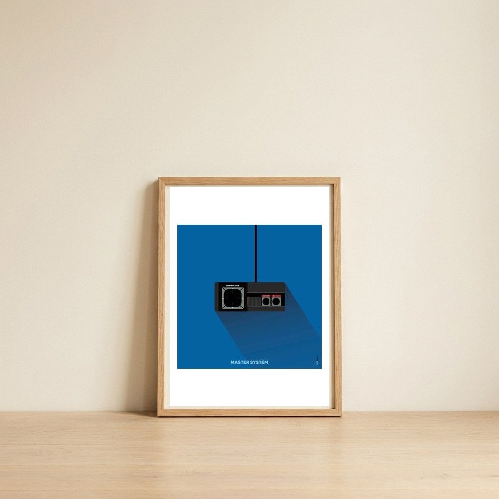 Joystick Videogames Master System — framed, leaning against the wall