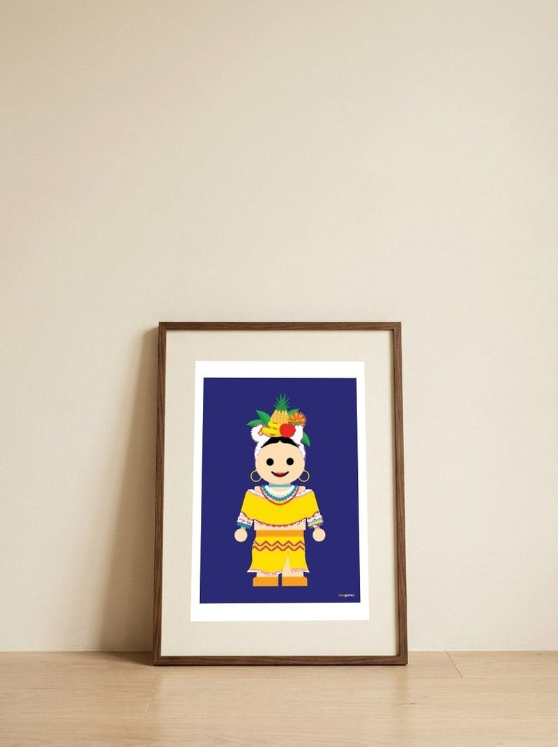 Carmen Miranda Toy — framed, leaning against the wall