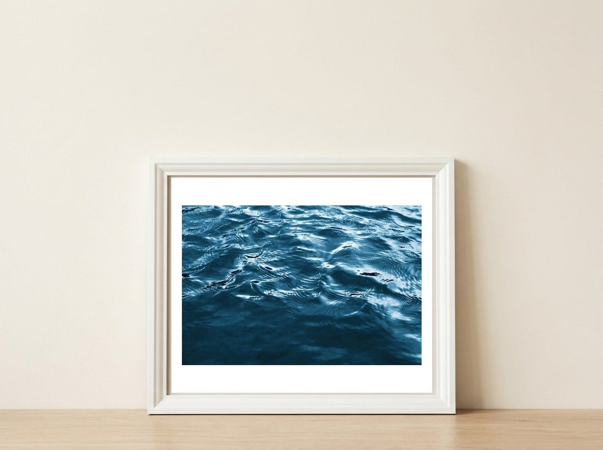 Water surface — framed, leaning against the wall