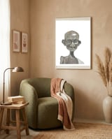 Mahatma Gandhi framed in a tender room thumbnail