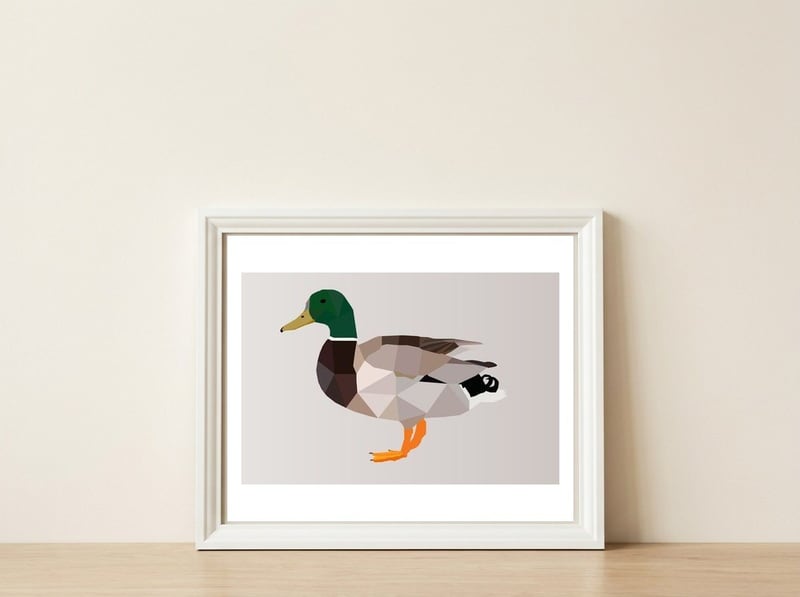 Duck Low Poly Art — framed, leaning against the wall