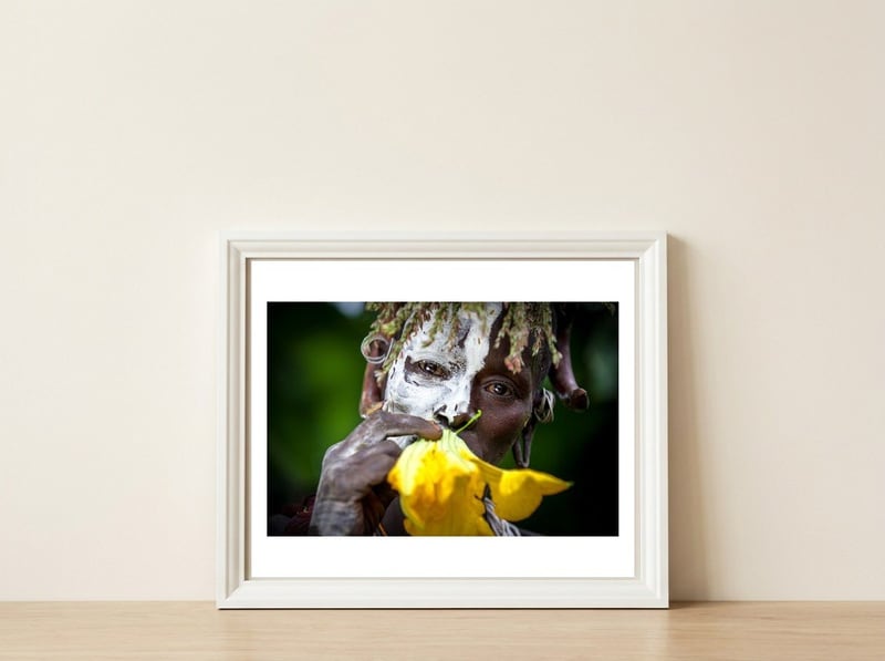 Sure flower — framed, leaning against the wall