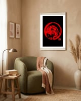 Aikdo in red framed in a tender room thumbnail