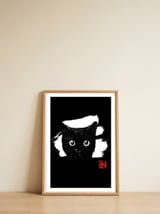 cat face in white — framed, leaning against the wall thumbnail