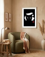 cat face in white framed in a tender room thumbnail