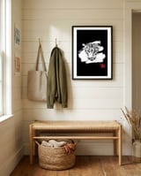 Leopard in white framed in a relaxed room thumbnail