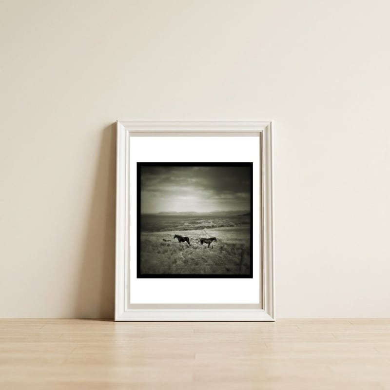 Gillen — framed, leaning against the wall