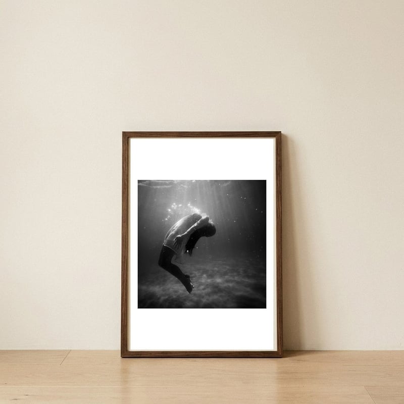 Woman Inside The Water — framed, leaning against the wall