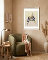 Two cute cockatiels framed in a tender room thumbnail