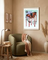 Leaking butterfly framed in a tender room thumbnail