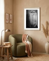 Naked body with saying as tattoo framed in a tender room thumbnail