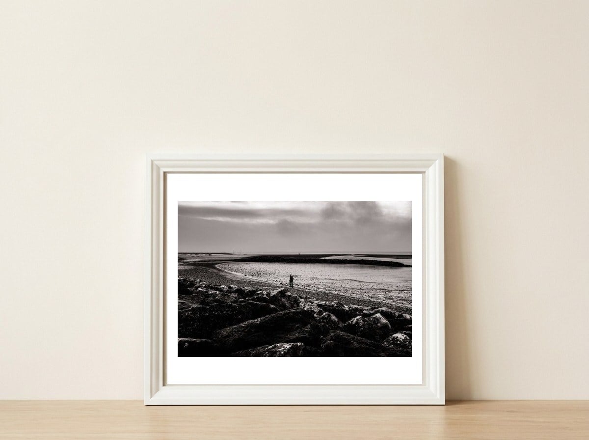 Morecambe Bay Runner — framed, leaning against the wall