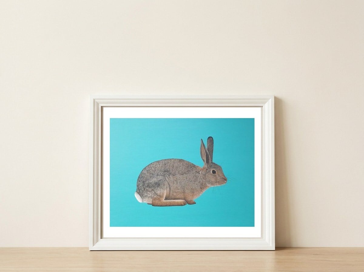 Rabbit — framed, leaning against the wall