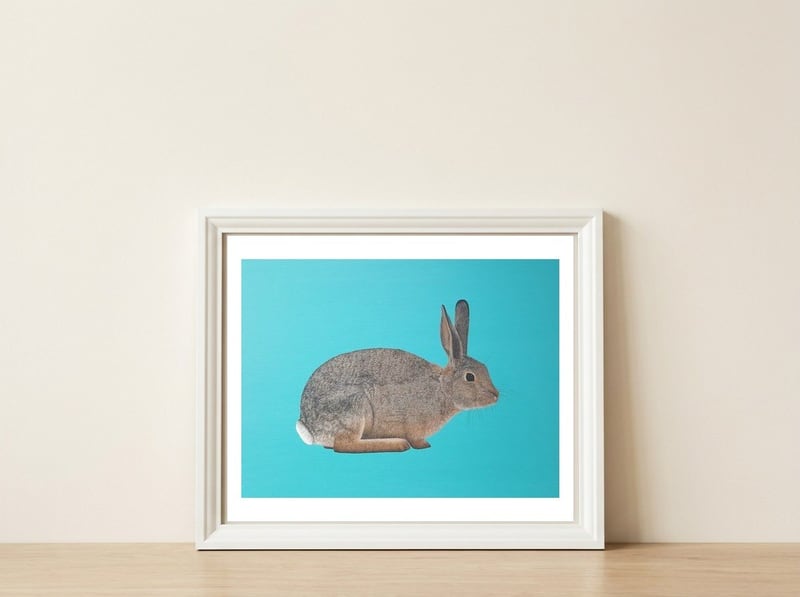 Rabbit — framed, leaning against the wall