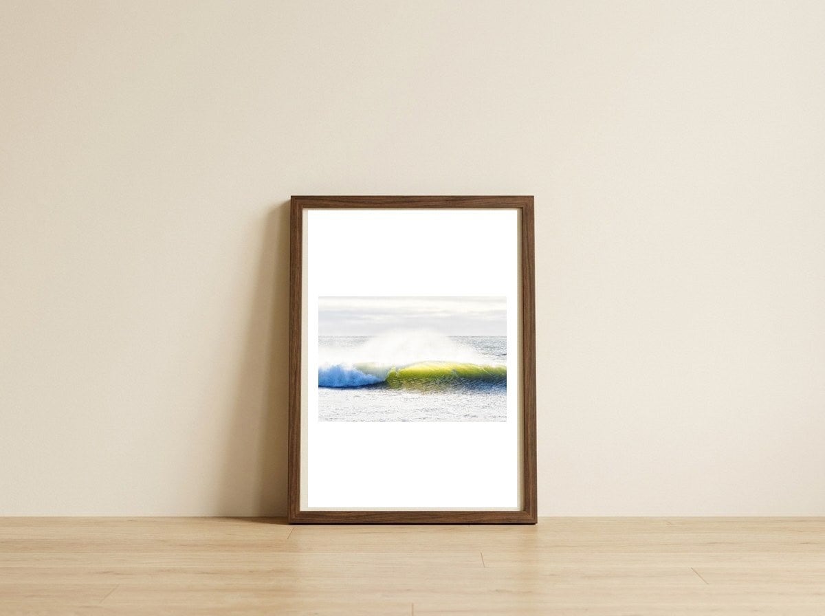 Sunlit wave — framed, leaning against the wall