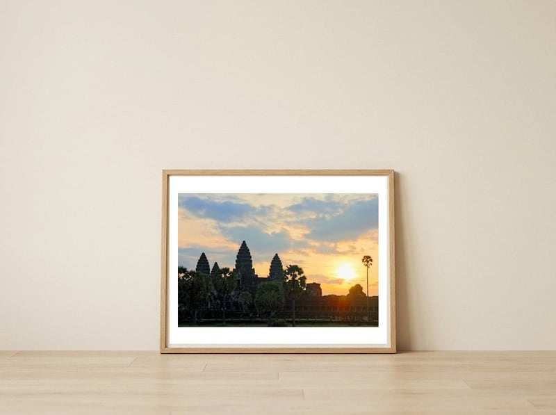 Dawn over Ankor Wat — framed, leaning against the wall