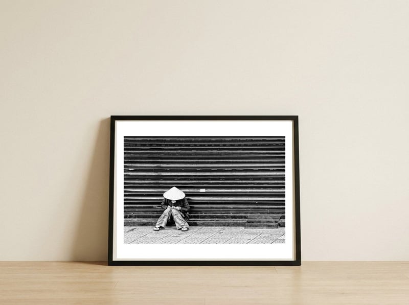 Street life — framed, leaning against the wall